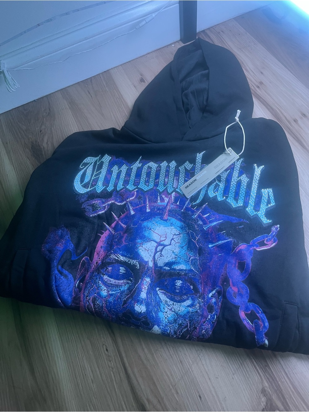 Reason Black Hoodie with Blue and Purple Graphic 'Untouchable'